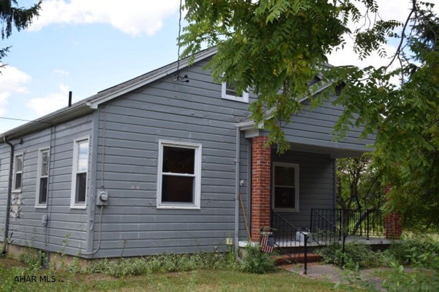 Fixer upper being sold as is. Hardwood floors.  Tons of potential.  Lovely neighborhood in quiet section of the borough near YMCA and schools.  Put your tool belt on and make this house awesome!