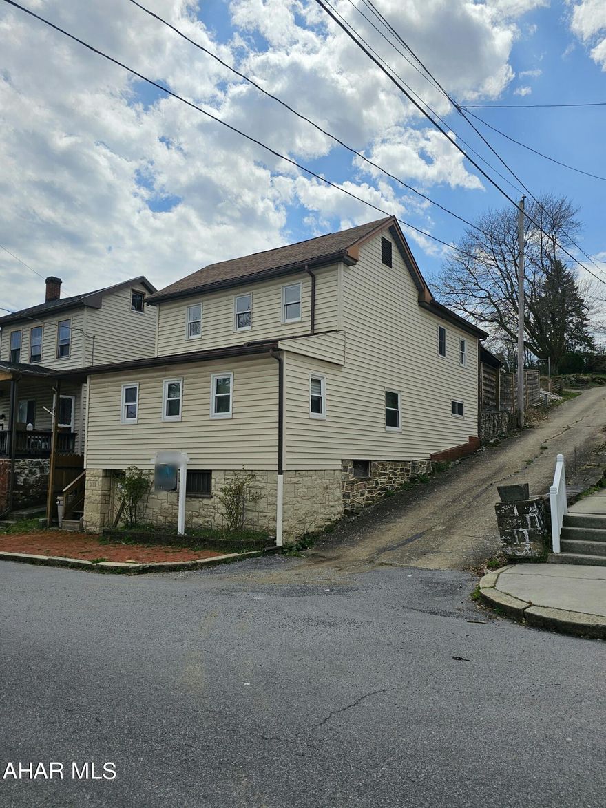 3 bedroom 1.75 bath home with detached garage. This home features a double lot, 2 bonus rooms, 1st floor bathroom, and an eat in kitchen, back patio leading to garage! Pre-approved buyers only. Buyers to confirm taxes, sq footage,  and lot size. Property is being sold in its current condition.