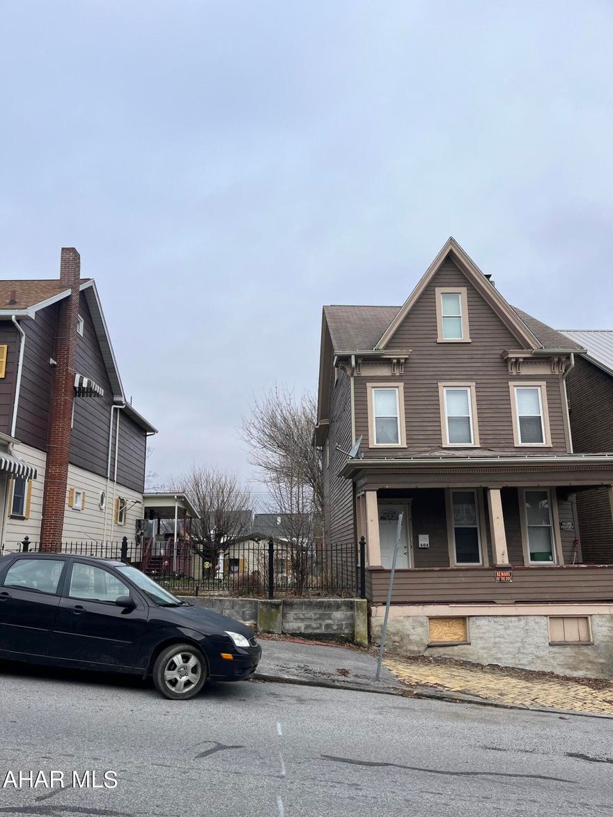 rent is 895 landlord pays w/s tenant pays the rest
DOUBLE LOT and garage 
Newer windows and furnace. Seller pays water/sewer. Tenant pays utilities. Partially finished attic.  ML#74104, 74105, 74106, 74107,  are being sold together as a package for $260000.