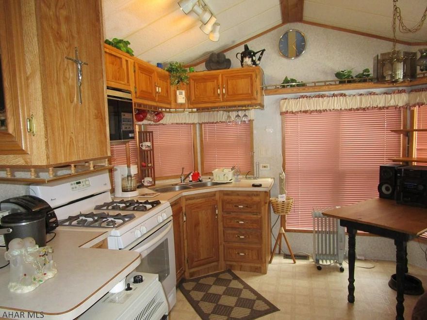 Extra room both inside and out. Park model with addition situated on an oversized campsite. Plenty of room for all inside with two bedrooms and sleeping room in the living room also. Outside you can access the property from Brookside Circle or Dutch Run Oval. There is lots of room for all of your outdoor activities with room for parking your vehicles or boat. Located in Glendale Yearound, a gated community with swimming pool, tennis/basketball/volleyball courts, club house, playgrounds, dog park, horseshoes. Adjacent to Prince Gallitzin State Park / Glendale Lake. Six miles from Rock Run ATV Park.