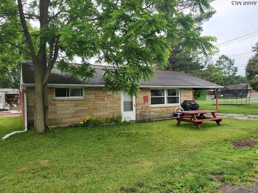 Tipton 2 bedroom brick ranch home.  Bellwood SD, public utilities on 120x60 lot with month-to-month tenant.