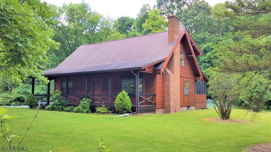 Rare opportunity to own such an amazing property! Custom built log home on 10 plus wooded acres. This beautiful home offers a spacious front porch and screened rear porch for relaxing. Convenient 1st floor laundry. Outdoor furnace to supplement oil heat. Plenty of space for your summer garden. Move-in and enjoy this incredible setting!