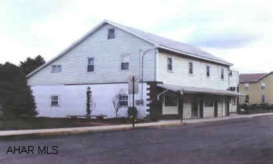 Nice 4 unit with good income and rental history.Large spacious apts. with modern kitchens and new stove and refrigerators.newer roof and windows.24 hour notice to show. Call office.