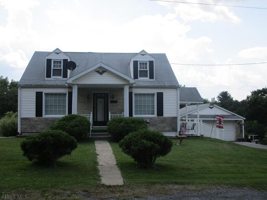 Attractive 1.5 story home on over a half acre lot. Home has been well maintained and features 3 bedrooms, kitchen with range and refrigerator, living room, first floor bedroom. Second floor has 2 bedrooms and a half bath. Full basement with sunroom. Nice 2 car detached garage with paved drive. Apple trees in rear yard.  Great rural setting!