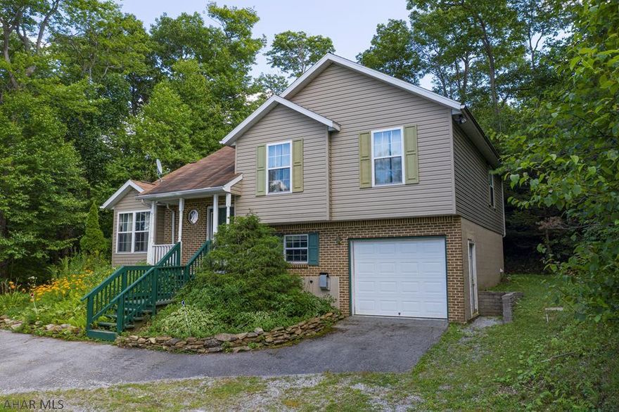 Make this affordable vacation home yours today! Chalet style home with 3 bedrooms and 2 full baths. Conveniently located between Bedford Village and Altoona, PA.