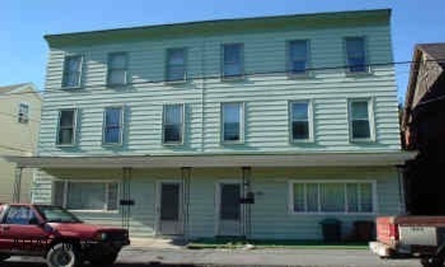 Double house with 3 bedrooms and bath on each side. Needs a new roof. Also 2 extra lots 1518-1520 Tenth Street included for parking.