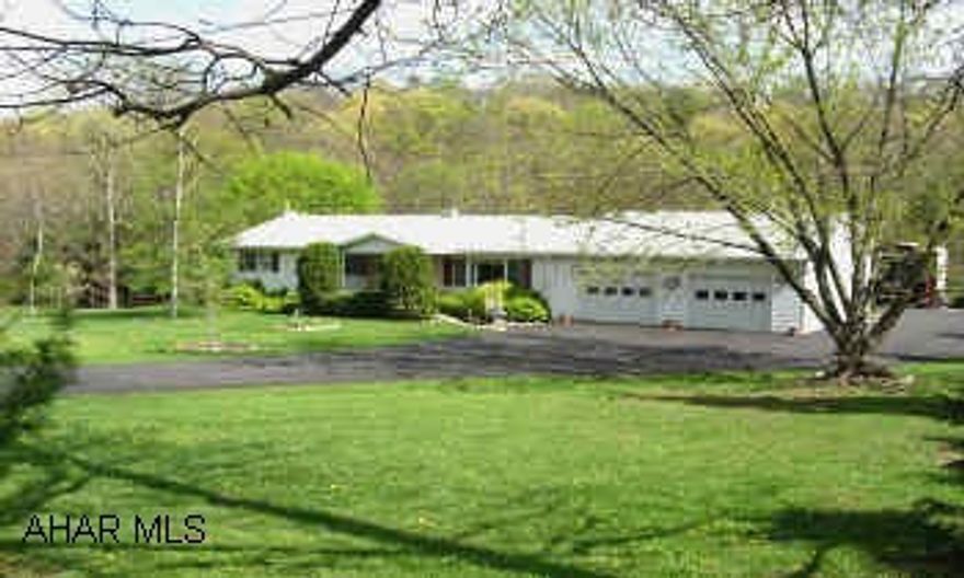 ONE ACRE LOT. TWO CAR ATTACHED GARAGE, PLUS DETACHED GARAGE, WITH SHOP, 2 CAR STALL AND 11 FT. STALL FOR RV OR BOAT. FAMILYROOM WITH BRICK GAS FIREPLACE. WORKSHOP OR OFFICE. LAUNDRY ROOM WITH SINK & SHOWER. PULL DOWN STEPS TO ATTIC. HOME WARRANTY OFFERED.