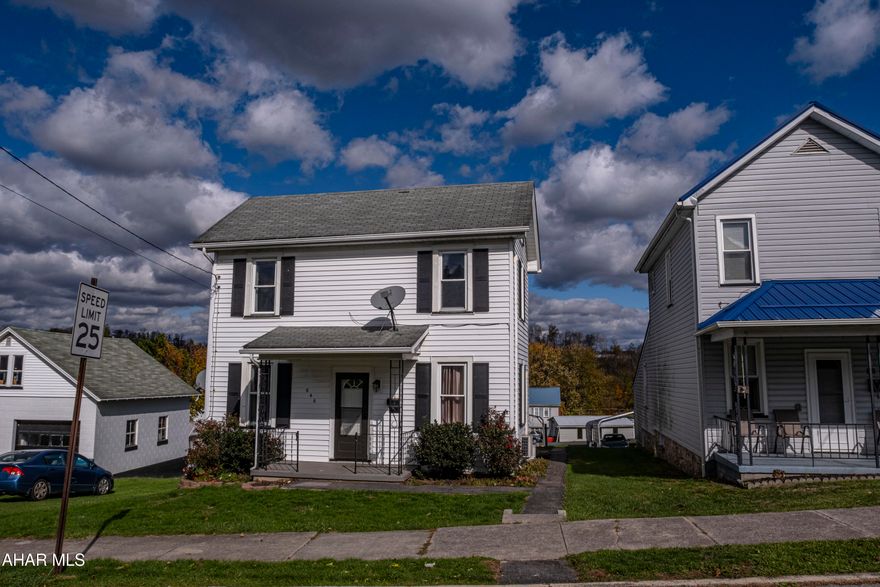 Perfect Family Home with Recent Upgrades! This delightful two-story, three-bedroom residence is designed for comfortable family living,  remodeled within the last 10 years, including a bright, modern kitchen and living room—ideal for gathering. Practicality is paramount with a dedicated mudroom for daily organization, a full upstairs bath, and laundry in the basement. Families will appreciate the immense storage and potential of the walk-up attic and the outdoor space offered by the decent size yard. Complete with a carport, this home delivers the character you love and the modern, low-maintenance functionality your family needs.