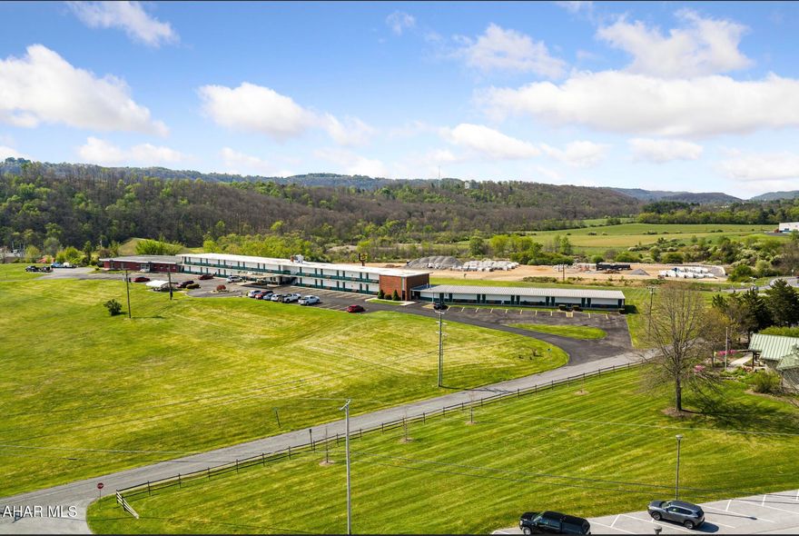 Motor Inn is a 48 room motel situated on approximately 12 acres in a prime location near major highway access. (Route 22, and Route 26). Currently generating $700,000 in gross annual income while operating 9 months out of the year, this property offers strong value-add potential. Features include an attached restaurant space ready for reactivation and ample land for future expansion or amenities. Located just minutes from a high-traffic recreational lake attracting 1.5-2 million visitors annually, this property is positioned in a thriving tourism corridor. Offered at $2,770,000 this rare opportunity to acquire a cash-flowing hospitality asset with significant upside doesn't come up often!