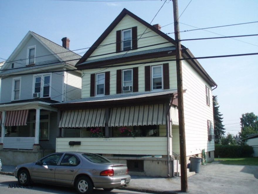 Affordable living in a quiet neighborhood. New windows, good furnace and side lot for off street parking. A good buy. Appliances included but not warranted.