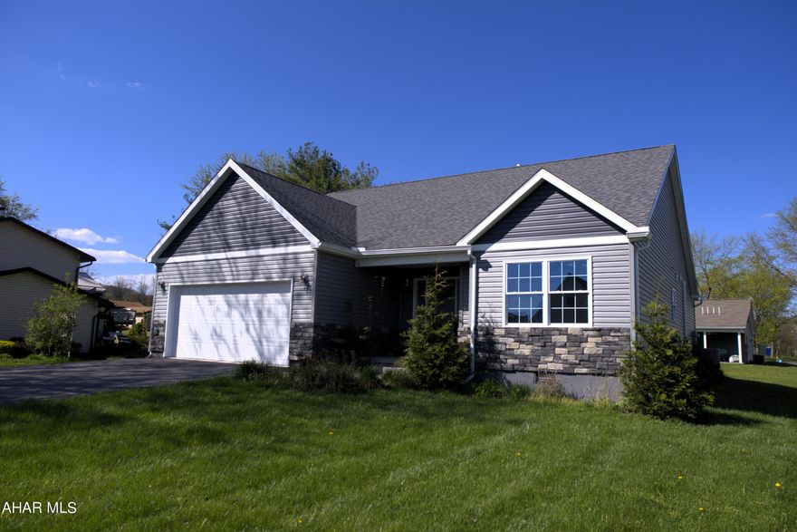 1 story, three bedroom, two full bath home with vinyl plank flooring and recessed lighting throughout. The kitchen features granite countertops, upgraded cabinets, and included appliances. Open floor plan with living room and dining room adjacent to the kitchen. The outside features real cut stone accent and an oversized two car attached garage with attic pulldown and storage. All on a nice flat lot in Old Town Village!