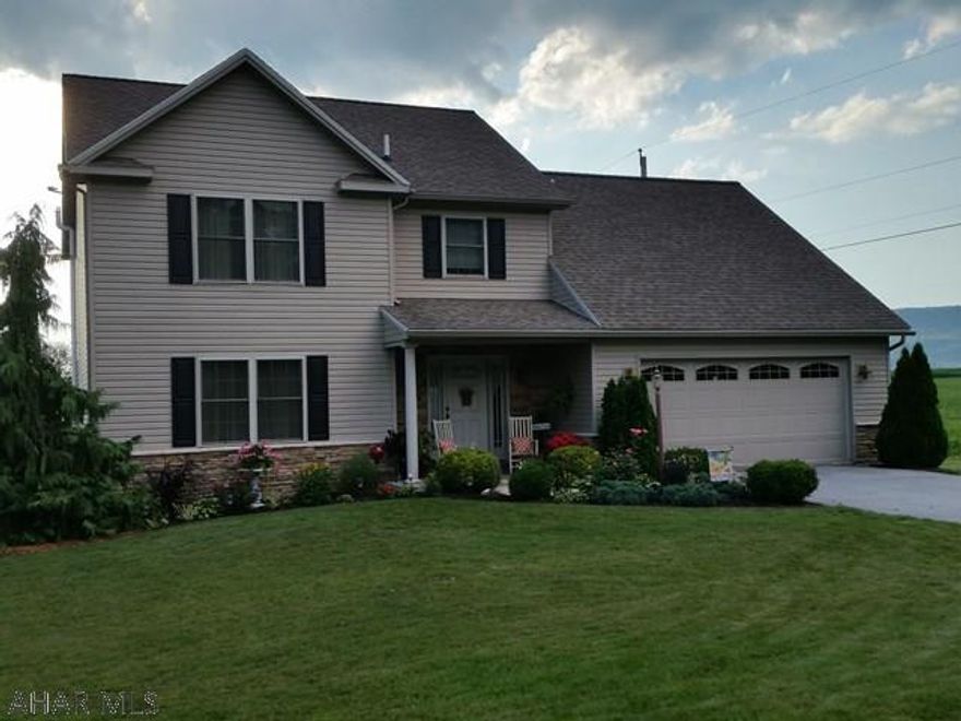 Meticulous 4-bedroom 2.5-bath home with main-level Family Room in gorgeous neighborhood on outskirts of town with public water & sewer, nicely landscaped plus great mountain views in the background. (Agent see comments) J-397