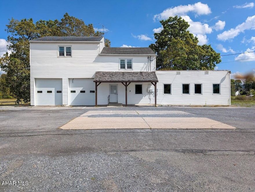 Looking for a property with good visibility along a busy roadway and near a growing commercial area? Here it is! This one sits on 10.37 acres that adjoins Dunnings Creek. This building has an open concept first floor with an estimated 2000+ sq. ft. which includes a converted garage space. A heat pump and oil/forced air furnace provides warmth and A/C for the entire first floor. The possibilities are many for this expansive space that has two half baths. The upper level 1200+ sq. ft. apartment is a three bedroom, one bath, kitchen w/laundry, and living room that's currently rented by a long term tenant and is serviced separately with electric heat and tenant's window A/C units. The vast field at the rear of the property and loads of parking along the highway are added bonuses and provides additional possibilities. Note: farm equipment currently displayed on lot are not included in this sale. Call to schedule your tour.