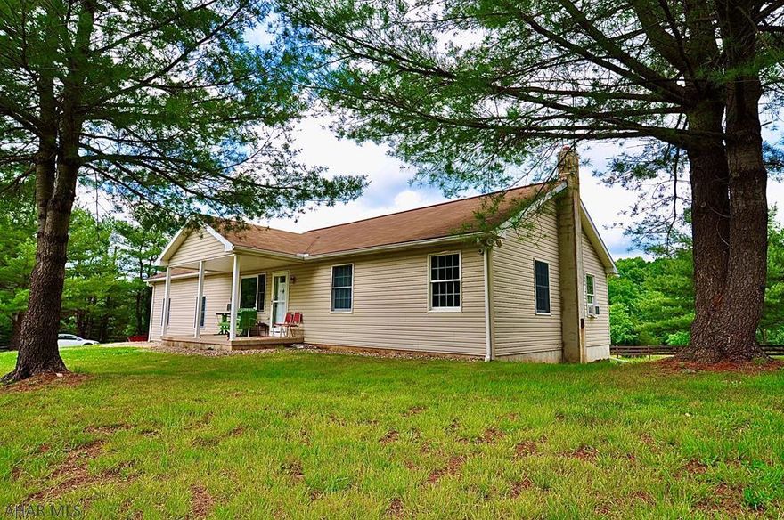 Wow! The perfect country rancher, tucked away and accessed by a nearly invisible private drive along Miller Road in Huntingdon County. The perfect layout, with 3 full bathrooms, 3 bedrooms, large eat in kitchen with skylight, large 2 car attached garage, tankless propane fired hot water heater, enormous wood stove in the finished walk out basement will heat the whole house and then some! Quality outbuilding equipped with electric, hot and cold water, and electric fence .. perfect for a few of your larger 4 legged friends. The property is picture perfect, completely private, and off the grid if that is your preference! Come see and enjoy and begin a whole new life here.