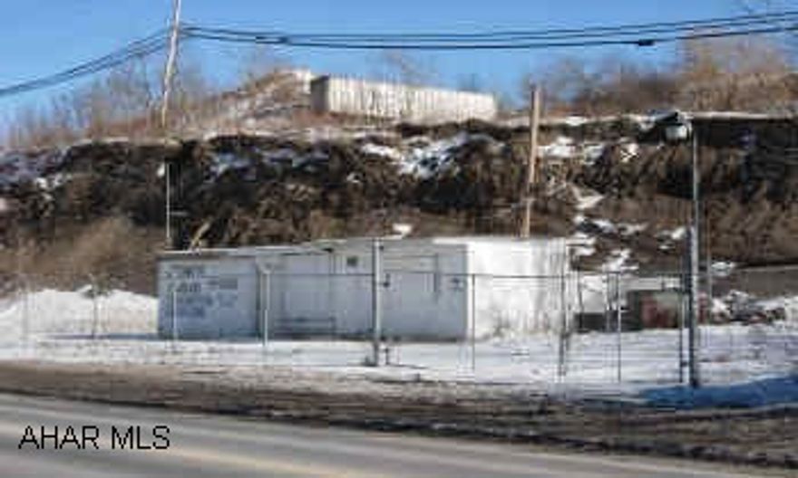 195X120 LOGAN TOWNSHIP LOT. FORMER AUTO SALES & REPAIR GARAGE. FORMER AUTO SALES & REPAIR. HIGH TRAFFIC COUNT. 195 FT. FRONTAGE.