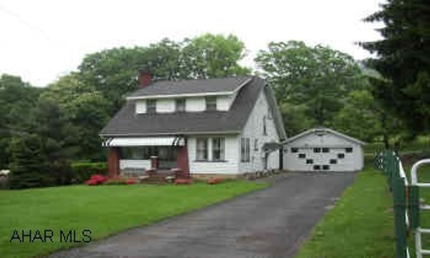 LOGAN TWP. CAPE COD WITH NICE FLAT LOT. FEATURES LR W/FIREPLACE, COZY SUNROOM, SCREENED REAR PORCH AND TWO CAR GARAGE. INEXPENSIVE LIVING. PRICED TO SELL!