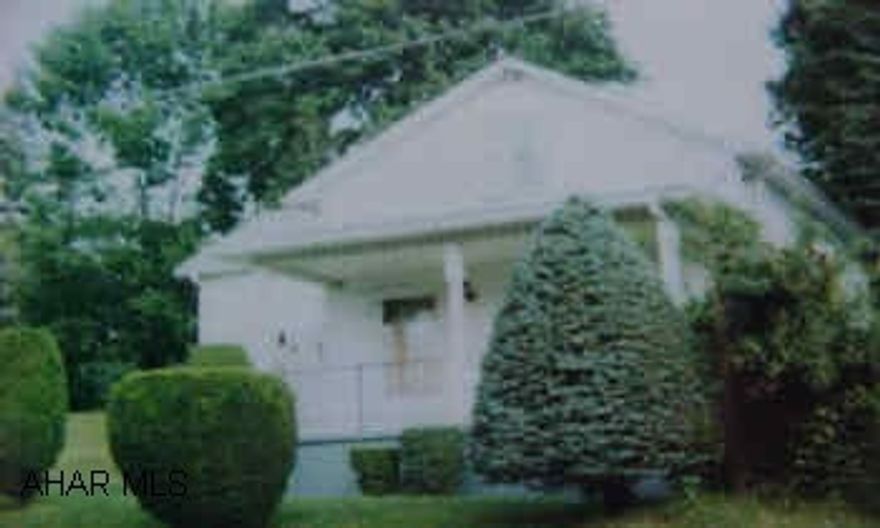 A cute cape cod with first floor laundry and updated wiring. DIRECTIONS:  From Cresson, take Country Club Road to 53- make right-cross bridge- first right