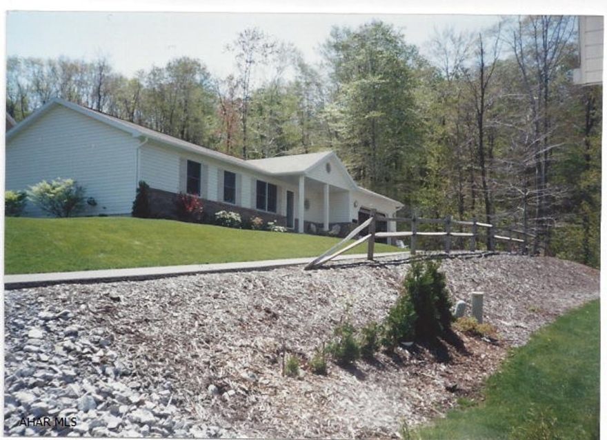 Nice ranch home with private lot, perfect for retirement couple or single person. Nice floor plan with vaulted ceilings. Covered front porch and and covered rear deck. Split rail fence, oversized one car garage.