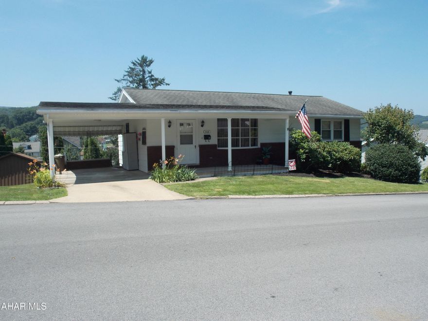 Easy living on one floor with this home on a 68 x 120 lot with a view of the mountains. The main floor has 2 bedrooms and an updated bath.  There is also a W/D combo unit on the main floor so no need to carry laundry downstairs. The updated eat in kitchen is bright and cheery and has a door from the carport for ease of unloading the car on grocery day.  The 2 bedrooms have HDWD floors which leads us to believe there may be HDWD under the carpet in the living room as well. The bath on the first floor and the one in the basement have been beautifully updated.
Down stairs is great for entertaining or could be an in-law suite or a rental.  There is space for a bedroom that fits a queen size bed and also a living room area and  a kitchenette area.  Down the hall you will find a beautiful new bath with W/D hookups. To keep the basement cozy and warm all winter there are 3 ceramic wall heaters.
Come spring the new owners with love that the basement walks out to a covered patio with a great view and a comfortable place to relax. The large back  yard is a great place to play or have a nice garden or a pool. 
This home also has lots of storage in the pull down attic and 2 storage rooms in the basement.
This one will not last long so call hurry and call for a showing!