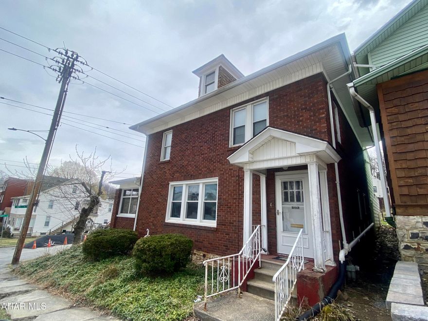 NEW PRICE!!!!Located in Calvert Hills this beautiful colonial home is move in ready.  The first floor features a spacious living room and dining room with hardwood floors, natural light, and built ins.  The charming kitchen boasts an abundance of cabinets.  The sun room is peaceful for these spring evenings.  Second floor features 3 large bedrooms with new carpet, and natural light.  Bonus room located behind full bath for endless potential of dressing room, walk in closet, or sitting area.  Attached 2 car garage.  Schedule your private showing!