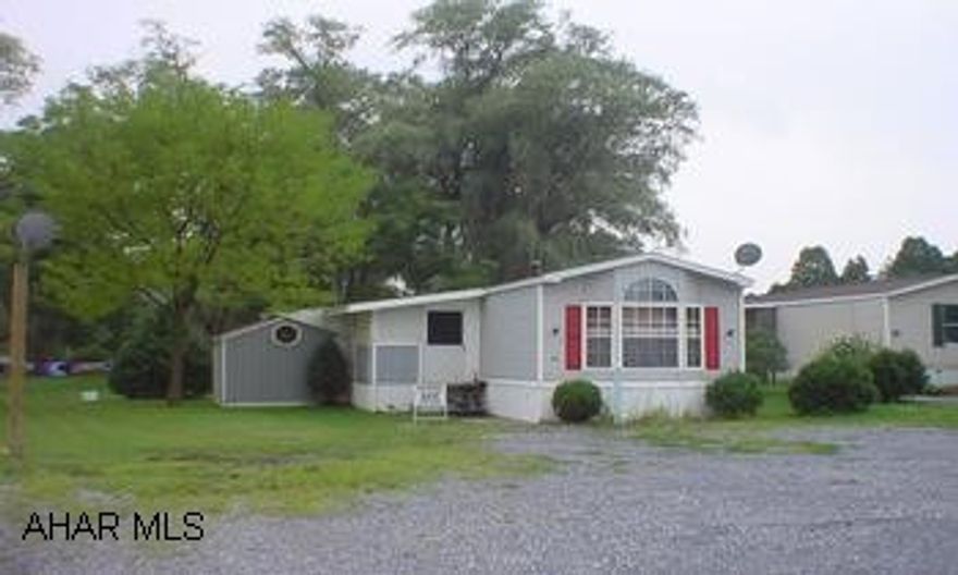 1986 Marlette mobile home (14x70) with MBR w/MBA, EIK, LR,  BR, BA, & laundry. Features cathedral ceilings, large screened-in covered porch and utilitiy shed. Minutes from PA turnpike and Lake Raystown. 1986 Marlette mobile home (14x70) with MBR w/MBA, EIK, LR, BR, BA & laundry. Features cathedral ceilings, large screened-in covered porch and utility shed. Minutes from PA turnpike and Lake Raystown.