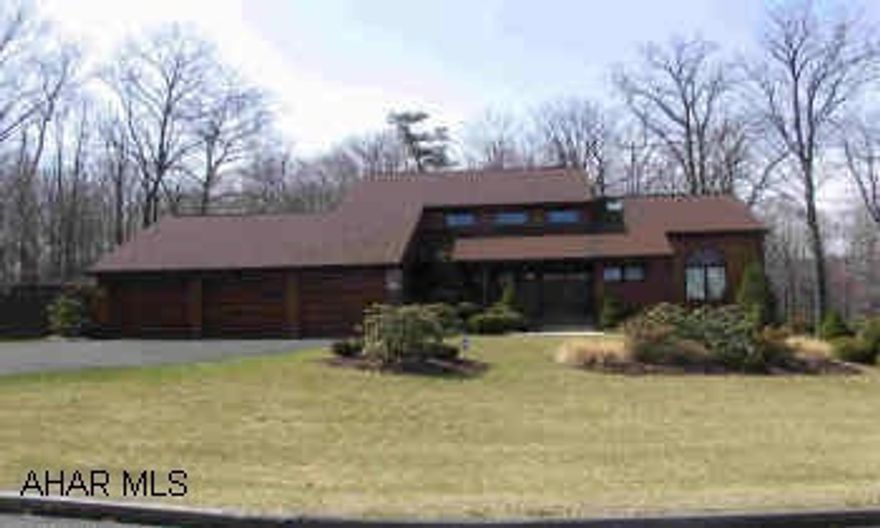 Spacious Cedar Contemporary home with elegant FLAIR, architect design, double lot, 4BR/3.5BA, 2 Family Rooms, Den, Formal Dr, Custom Kitchen, Greatroom, Game Room, Sun Room. Has in-ground pool, pool house, professional landscaping, located on cul-de-sac, woodland views, master bath has jacuzzi. Large walk-in cedar closet on lower level.