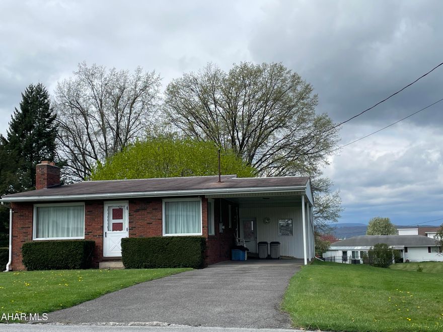 Your future home is here. Don't let this 3 bedroom 2 bath home fool you. It has tons of space with lots of potential. Lots of closets for storage, first floor laundry, lots of kitchen storage, hardwood floors, open floor plan. Large finished family room in basement with fireplace and bath, attached carport, central air, beautiful back yard, Located in a great neighborhood across from the Memorial Park.