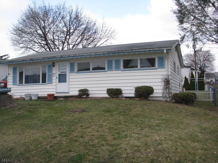 Nice rancher in a wonderful neighborhood.  It is close to stores, schools, restaurants and playgrounds.  There are three nice sized bedrooms along with an eat in kitchen. Hardwood floors throughout.   Large fenced in back yard.  Whether downsizing or just starting out this could be the home for you.  With a little fixing up this could be your dream home.