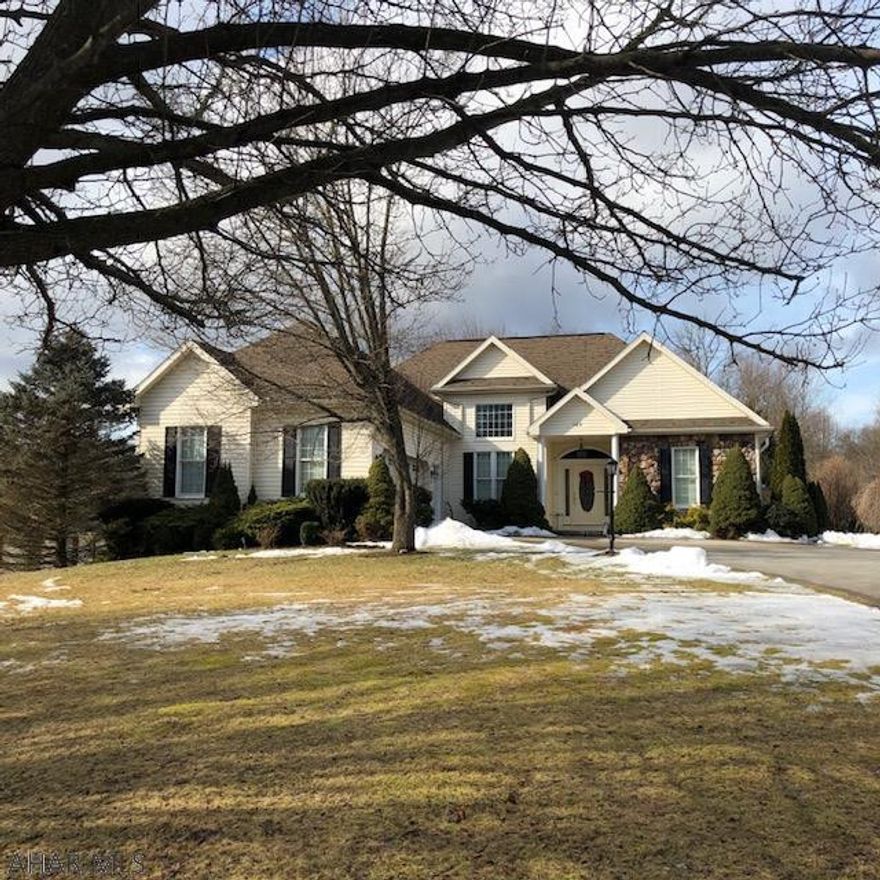 Fabulous one story home located on a beautifully landscaped large lot in Juniata Mills Development.  This home's floor plan has easy living in mind with its sweeping cathedral ceilings in the foyer that's open to the living room and formal dining area.  Cozy up in the breakfast nook and enjoy the beautiful views of the bird feeders and lovely back yard.  The galley style kitchen w/granite counter tops has everything for easy meal preparation.  Sit back and relax in the beautiful all-season sun room with fireplace and easy access to the rear patio and hot tub.  The bedrooms are split on each side of the home to ensure privacy in your very own master bedroom suite with master bath.  Take a look for yourself!