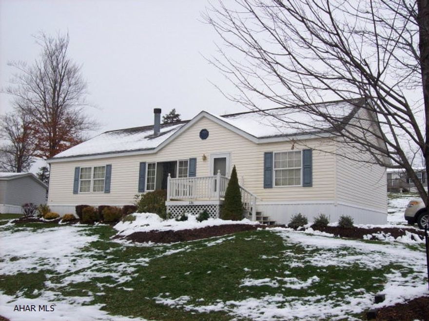 Immaculate home on a beautiful corner lot that is secluded from the rest of the village.  Has many upgrades including: central air, fireplace, open floor plan and an extra spacious kitchen.  Perfect for a retirement home.