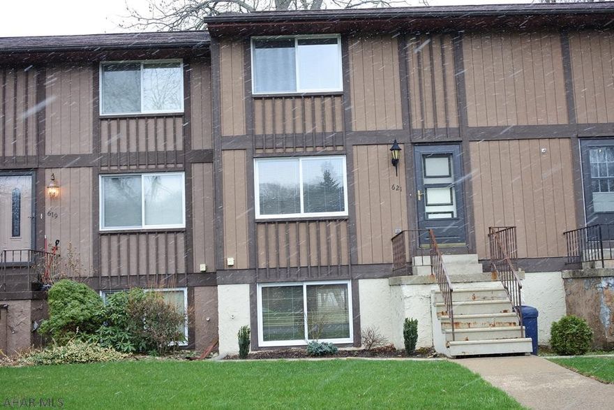 Townhouse with a country feel.  Close to shopping and restaurants.  Nice yard, deck and a stream...not in the flood zone.