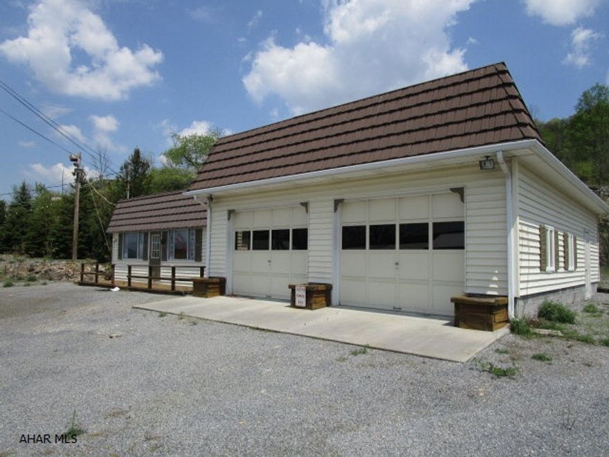 High traffic location just outside the Bedford Borough. 12' x 24' office building and 28' x 34' garage. Property was previously a very successful used car dealership with owner retiring. Close to the Bedford Turnpike Interchange, tiered lot for display, no zoning and 1.574 acre lot.