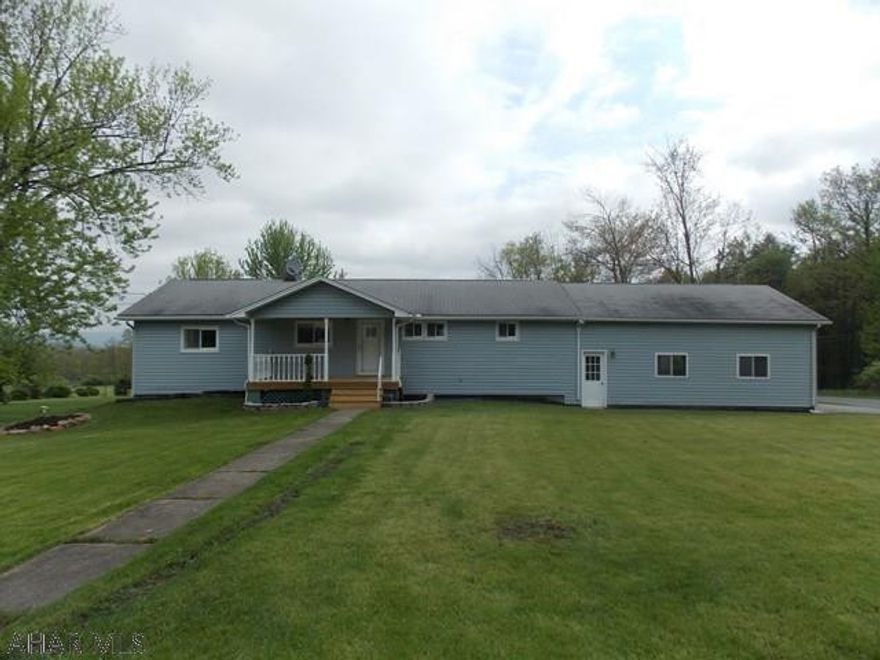 Beautiful 2.3 acre lot and cute 3 bedroom, 1 bathroom ranch home with a 2 car garage with tons of storage. New kitchen with stove top and wall oven, new bath with walk-in shower, new windows, new porches are just a few things this home has to offer, but the ground sets it apart. Plenty of room to add on, put in a pool or play baseball. Hurry this one will not last!   Garage is 23 x 29 with storage above