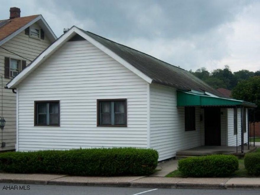 Cozy cape cod. Very spacious rooms, nice big country kitchen, great living room, lots of closet space throughout, laundry/ mud room, attached garage. With in walking distance of businesses and school district. Supplemental coal heat!