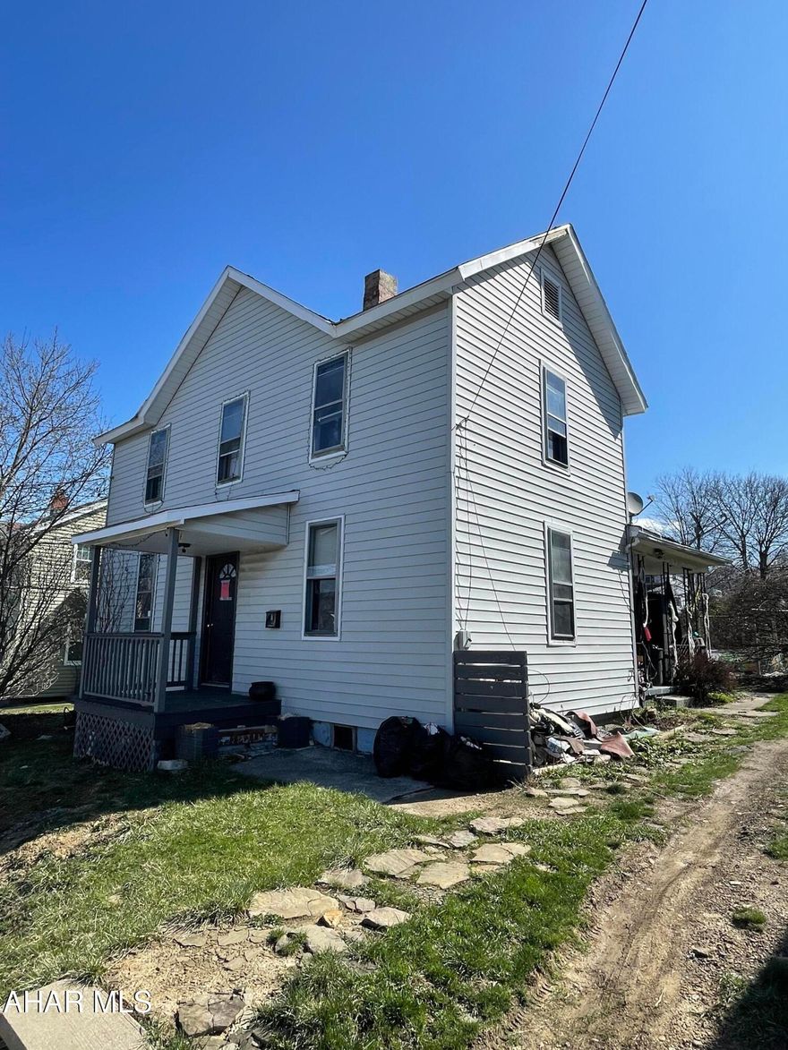 Investors get ready for a flip!  This large 3 bedroom 1 bath home is surrounded by beautifully maintained homes in a quiet neighborhood in Portage Borough! House is being sold AS IS! Electric is still on, water and gas were shut off to the property. Sewer line was redone in 2022, however buyer will be responsible for doing the pressure test.  Buyer will also be responsible for replacing water line if necessary and installing meter pit that is now required by the municipality.  New side walk was poured last year.  There are several code violations on file against the property, buyer will be responsible for bringing home up to code.