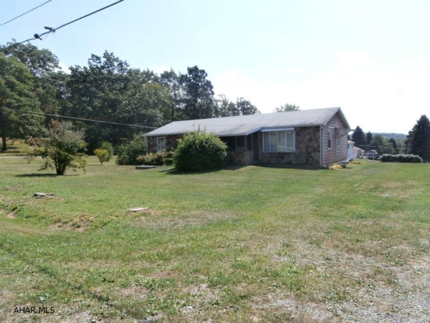 Huge lot in great location! House is of modular construction and needs some updating. Full basement with some finish. One side of the basement wall is pushing. Price has been adjusted accordingly. Great opportunity for the handy person.