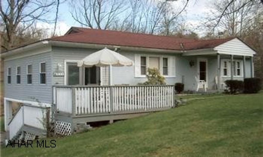 Charming home with exceptional back yard, tranquil stream and mature trees Charming home with exceptional back yard, tranquil stream and mature trees. Family room in basement with fireplace, stone surround, built-in bar areas. Laundry room, deck, shed, paved driveway. Workshop area in garage.