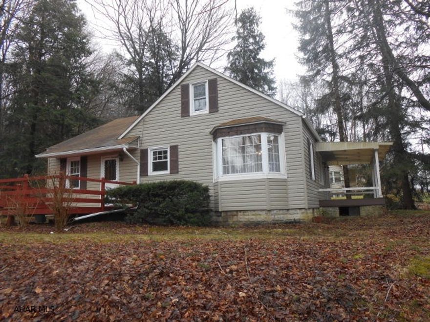 Cozy and convenient location on 1 acre.Hard wood floors through out,offers extra closet space,wood fireplace,walk up attic open area possibly finish off into living space.New siding,gutters and windows,freshly painted porch.2015 full house insp.,newer sewer lines and survey posts visible.Furnace serviced in 2015.