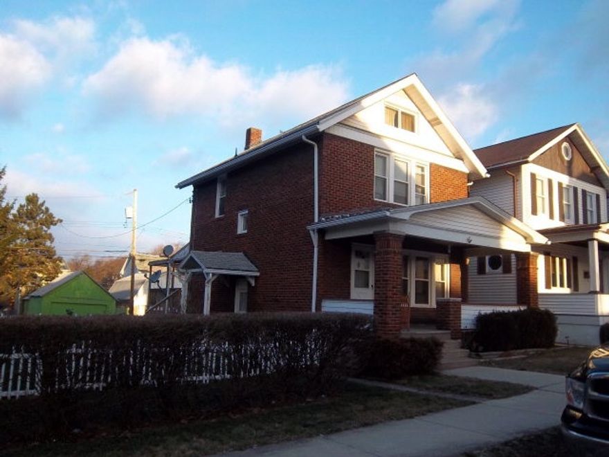 This beautiful brick home sits on a FLAT double fenced in lot, has new windows,front door and the furnace is only a year old! Updated bathroom, Kitchen cabinets/counter top, newer landscaping, and spacious back deck make this an absolute must have. Conveniently located close to shopping and highway, yet nestled in popular East End area. Hard to find a double lot that is FLAT with alley access! This home will not last at this price!