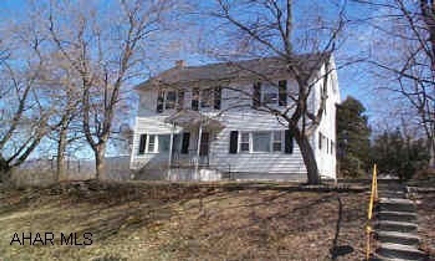 Attractive 2 story home on large, secluded lot. 2 bedrooms. Large master bedroom wall was removed. Could be 3 bedroom again. Vinyl siding, new windows, located in East Juniata on private wooded lot.