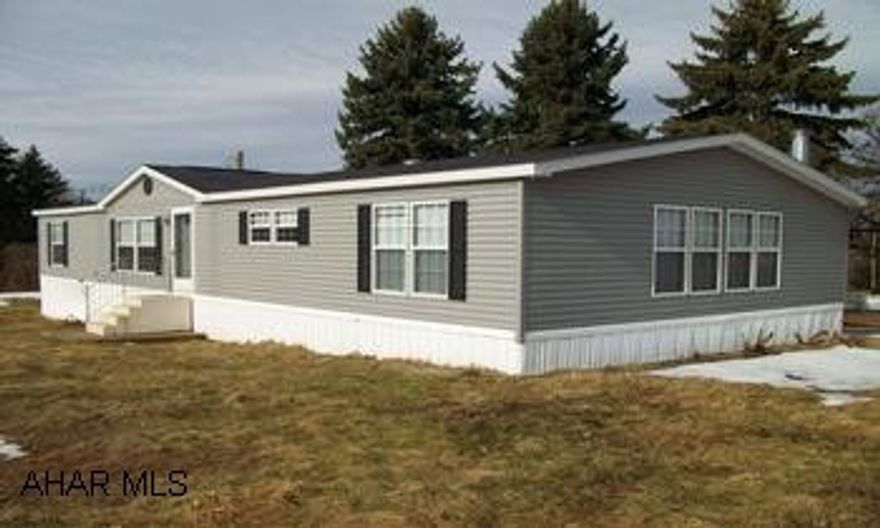 Very well kept doublwide wide on 114 x 140 lot.  See interior photos!   Sold as is.