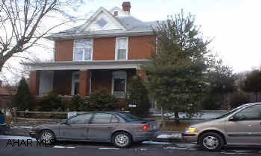 LARGE 2 1/2  STORY BRICK HOME IN JUNIATA. HAVE A GROWING FAMILY?  THIS HOME HAS THE ROOM.  BRICK HOME, REPLACEMENT WINDOWS, HEATED ATTIC, 1ST FLOOR LAUNDRY, AND OFF STREET PARKING.  2 ZONE HW HEAT.