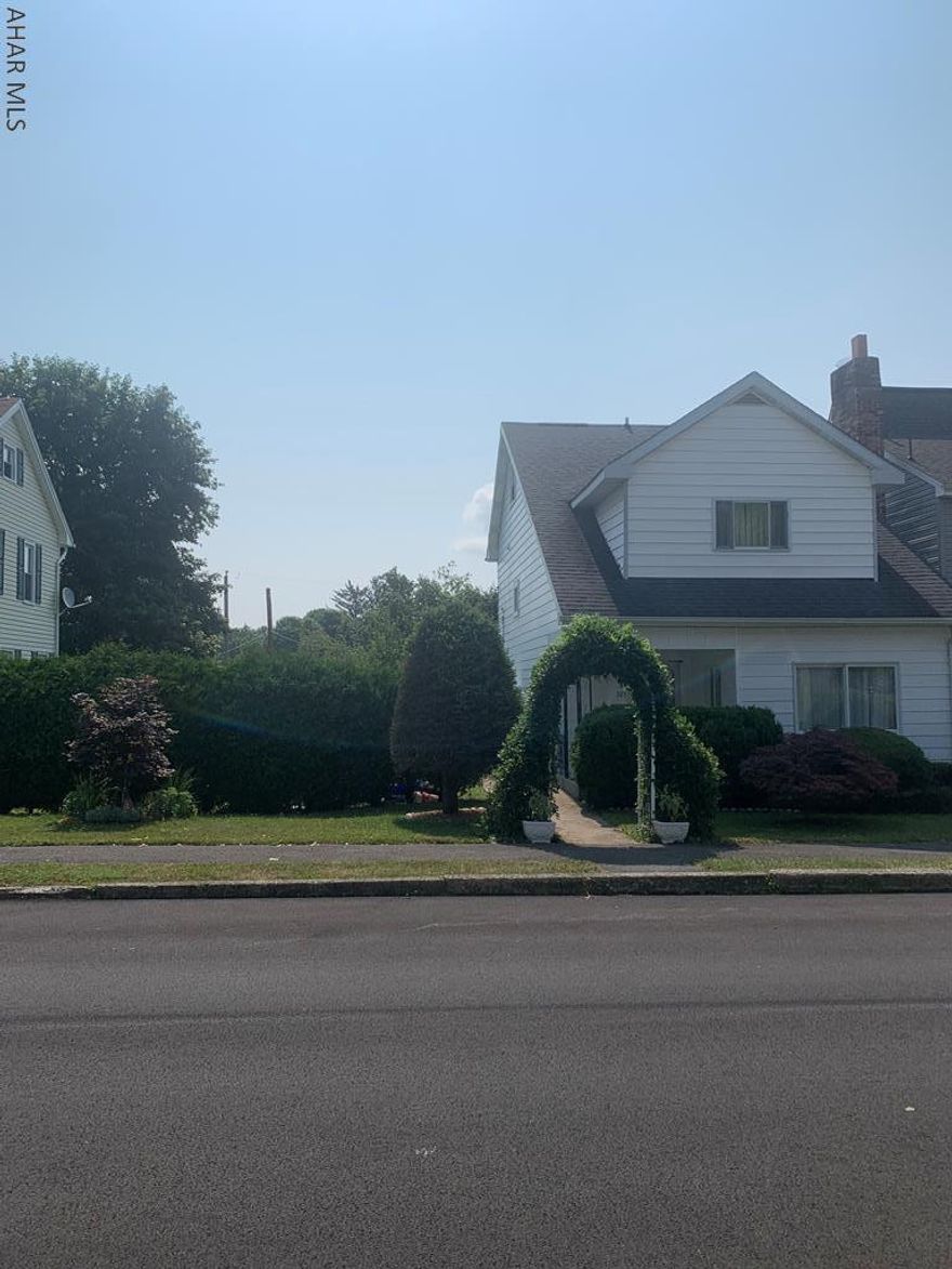 This property is close to Penn State Altoona, located on a double lot.  It offers 2, possibly 3 BR, 1 full bath, one 3/4 bath and one 1/2 bath.  An additional 3/4 bath in basement.  The DR was converted to in-law suite.  An additional 1/2 of a wall being replaced would convert back to DR or 3rd BR.  Newer windows throughout and central air.  The attic has a walk-in closet and built-ins for storage and was used as a BR.  It has 1/2 bath.  The double lot has abundance of fruit trees, scrubs, and raised tumbled brick garden.  With the shrubs, the back yard is very private.  The 2 car garage is 2 floors.  The electric in it was recently updated.  Property taxes for 2021 were $1,950.  Square footage needs to be verified .  No commission based on sellers assist.