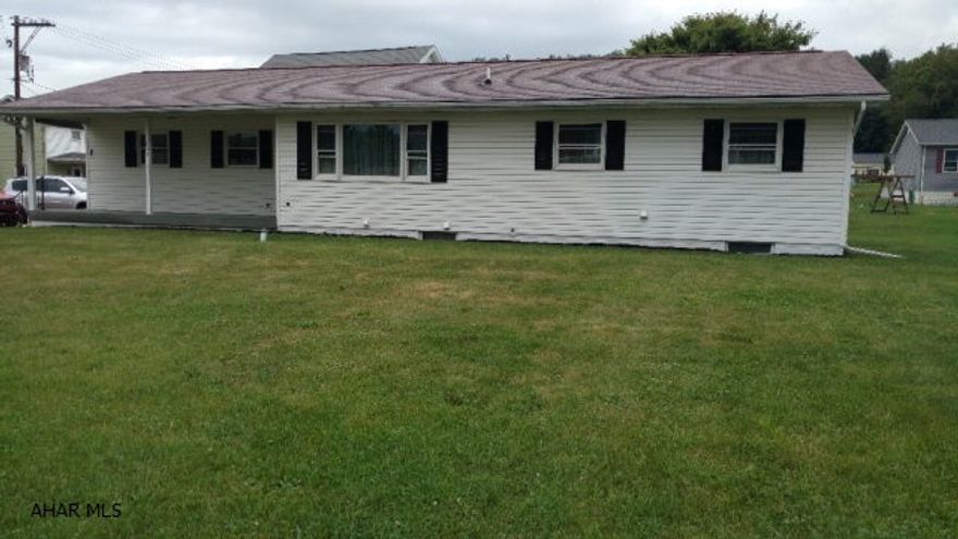 Enjoy convenient living in this one floor move in ready 3 bedroom ranch with oversize 2  car garage.