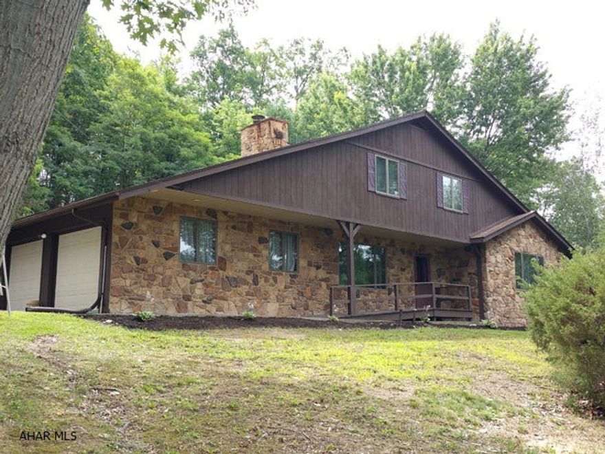 Remodeled 3 bedroom split-level in Bellwood-Antis School District.  2 1/2 baths. Updated kitchen, bathrooms and flooring. Fireplace in family room. Finished rec room in basement.  Oil hot water baseboard heating system plus a heat pump. 2 car attached garage. Screened porch, rear deck. Must be seen.