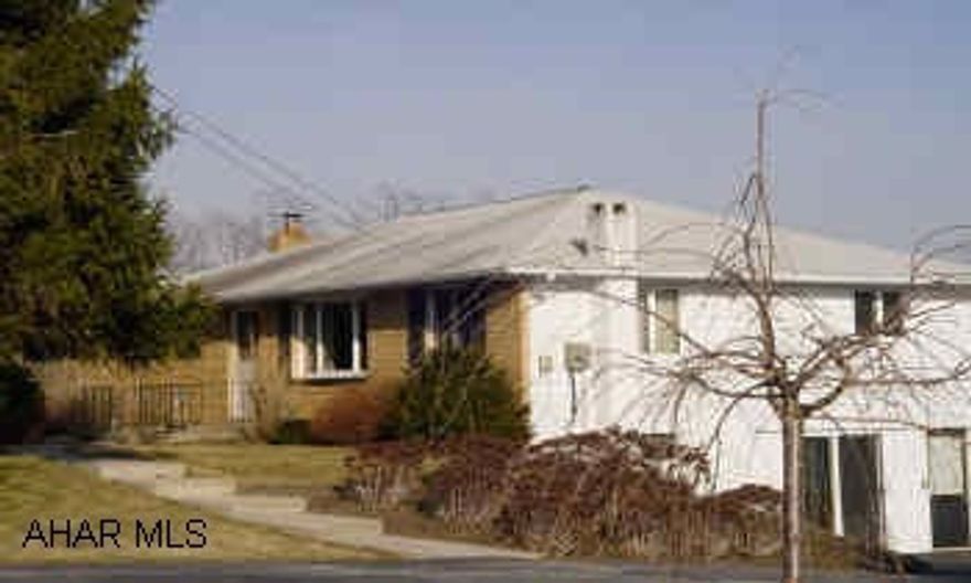 One story living advantages. Two family rooms in basement, one with fireplace with woodburner insert.  Laundry on the first floor.  Master bedroom with sitting room addition. Second bath in basement unfinished. One story living advantages.  Laundry on first floor.  Two family rooms in basement, one with fireplace with woodburner insert.  Master bedroom with sitting room addition. Deck on rear.   Two types of heat.  Several heating options, oil hot air, electric, and woodburner.