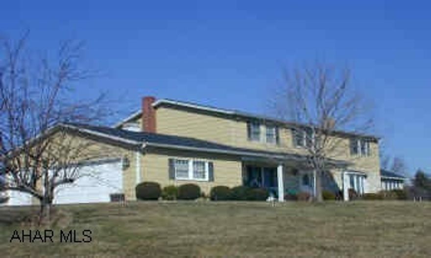 2 Story tradional style home on 14.25 acres. Open acreage, 32 x 40 barn.