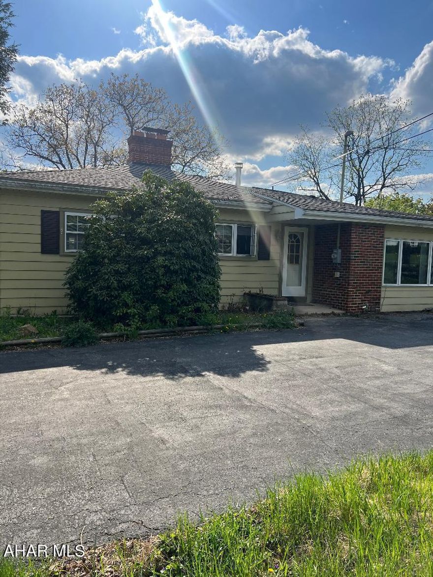 Three bedroom ranch in Sylvan Hills. Home offers hard wood floors, bright sunny rooms, large family room and flat large yard.