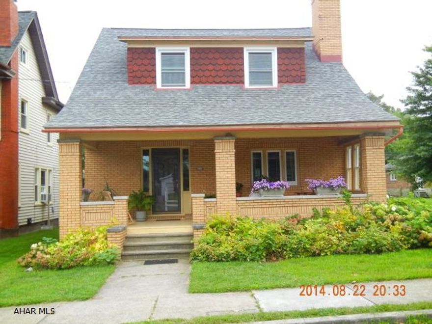 Great Hollidaysburg all brick home. Only a few blocks from schools and YMCA. Living room with gas fireplace, 1 bath, formal dining room, great sunroom. Kitchen with pantry and breakfast nook. 4 bedrooms, newer roof, newer windows, hardwood floors, garden, great mechanics, all on a large private secluded lot, with off street parking in rear.