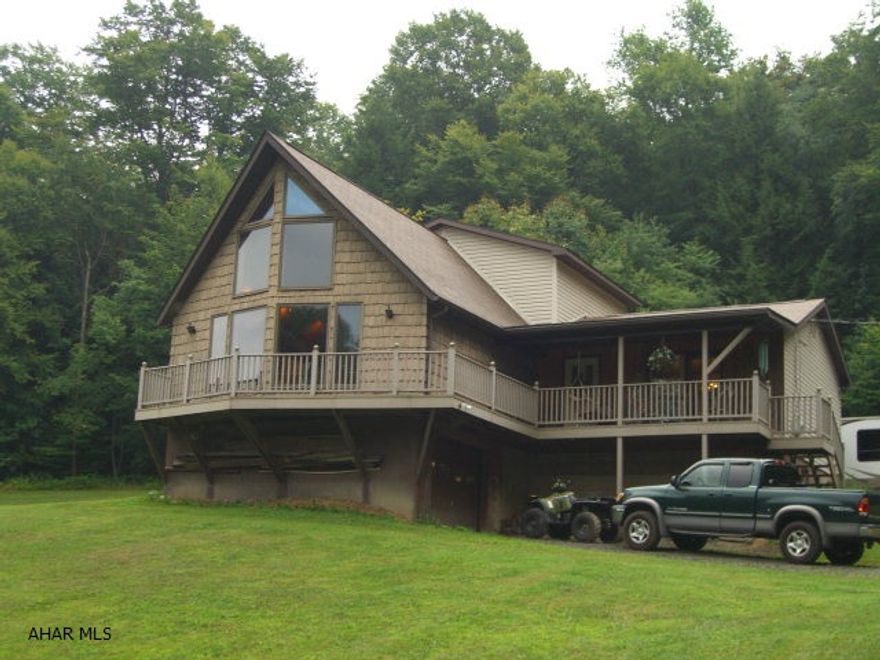 This is a gem of a home on 5 private acres in Marsteller.  Enjoy the view from the wall of glass in your great room or sit on the porch while enjoying the wildlife passing through the yard. Call today for an appointment.